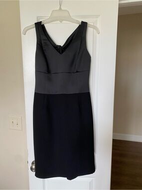 Satin twist back black cocktail dress